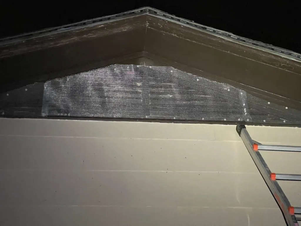 Rodent cloth covering an attic vent at a Birmingham, Alabama home.