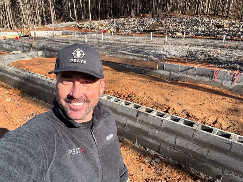 Parker Darnell, Pest X owner, at a home construction site in Jasper, Alabama.